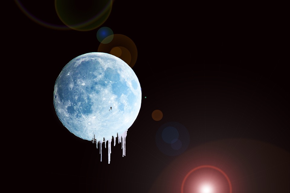 A digitally manipulated image of a full moon with an added dripping effect, against a black background with lens flare, evoking thoughts on climate effects.